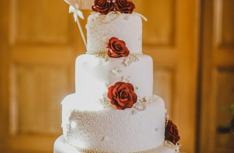 round white floral 4 tiered fondant cake scaled 2